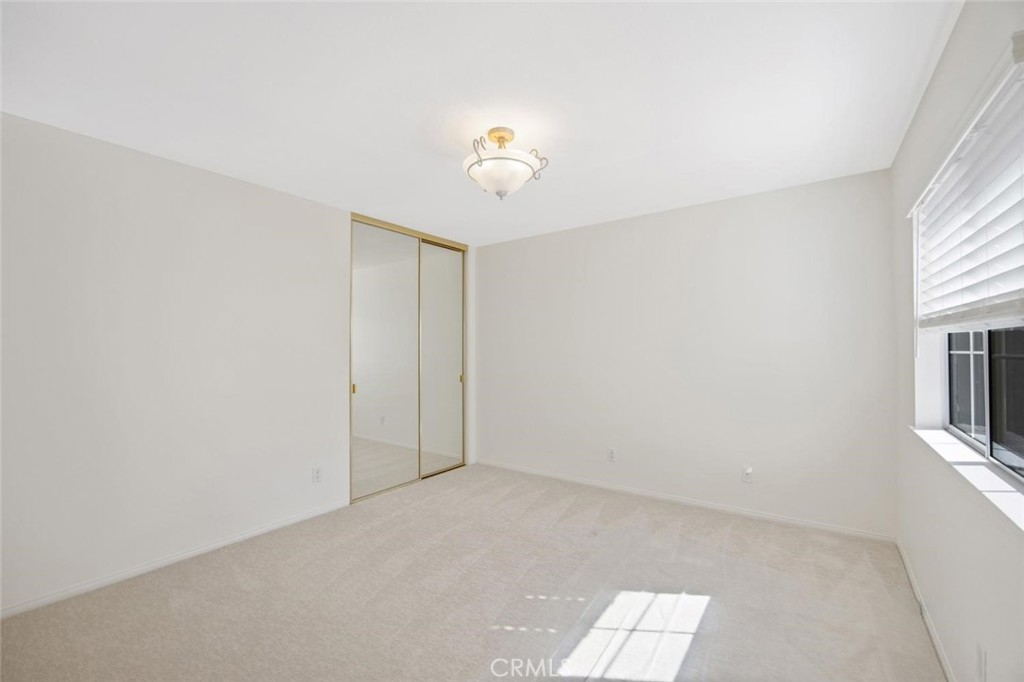 5974 Ruthwood Drive Calabasas, CA 91302 - Photo 17 of 30 an empty room with a window