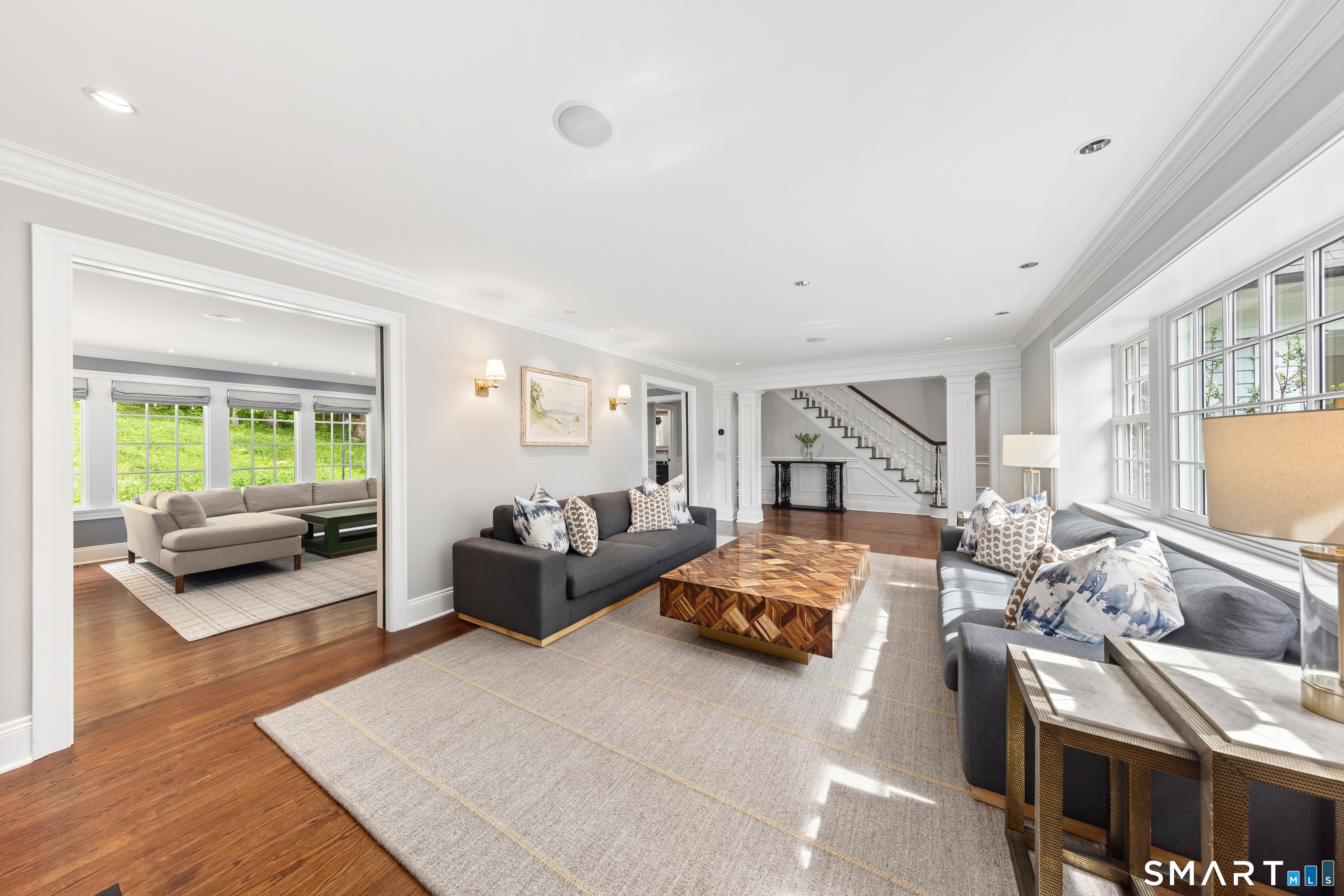 99 Hickok Road New Canaan, CT 06840 - Photo 5 of 39 a living room with furniture and a wooden floor