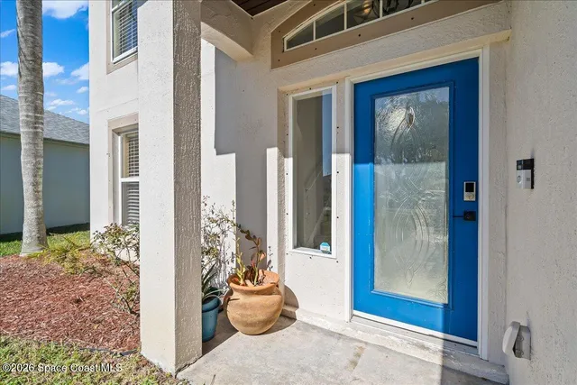 a view of a entryway front of a house