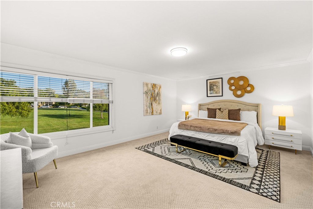 19 Alameda Irvine, CA 92620 - Photo 21 of 59 a bedroom with furniture and a floor to ceiling window