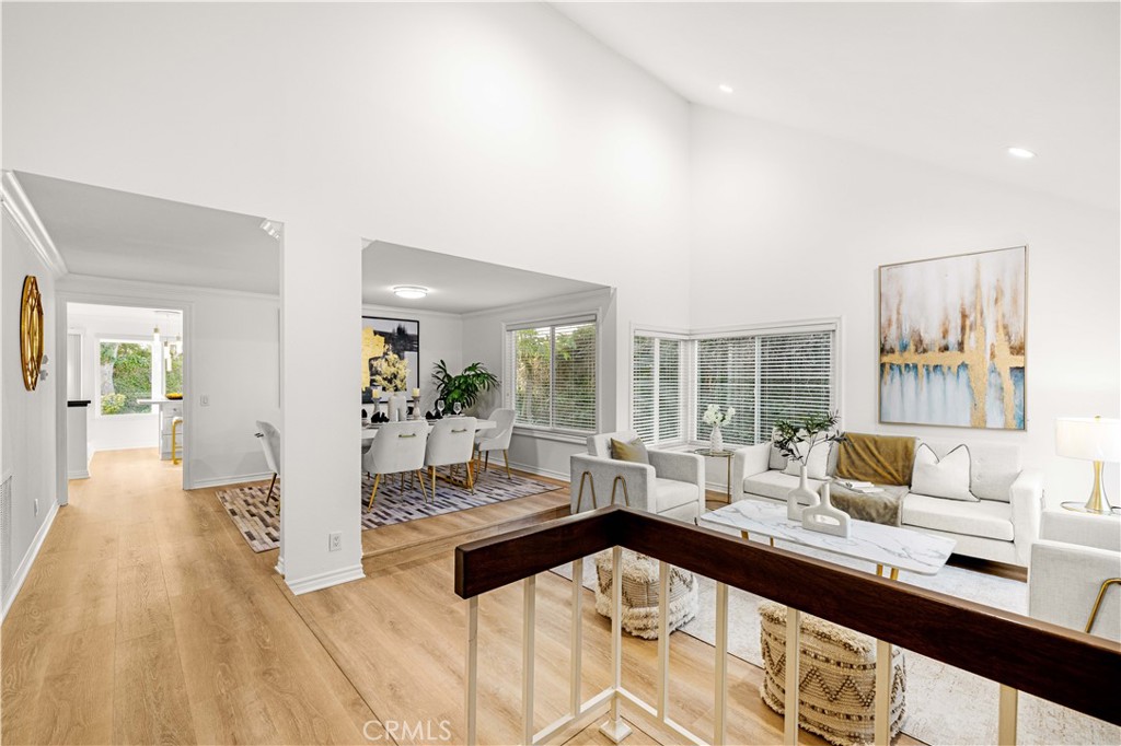 19 Alameda Irvine, CA 92620 - Photo 3 of 59 a living room with furniture and a table