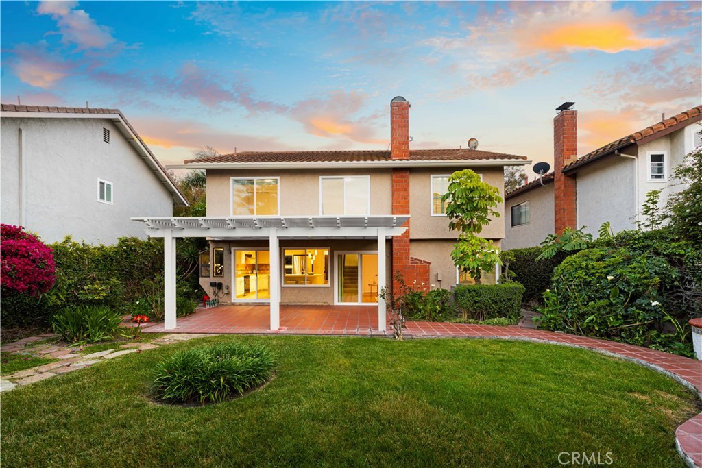 19 Alameda Irvine, CA 92620 - Photo 44 of 59 a front view of a house with a yard
