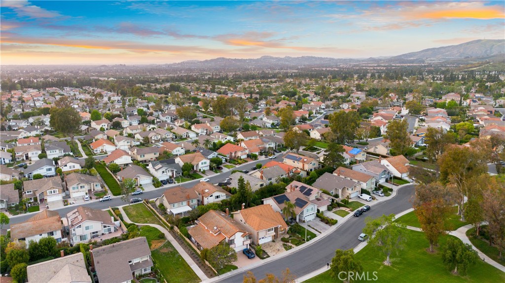 19 Alameda Irvine, CA 92620 - Photo 48 of 59 an aerial view of residential houses with outdoor space