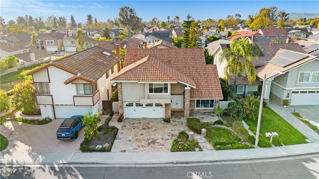 19 Alameda Irvine, CA 92620 - Photo 51 of 59 a front view of a house with garden