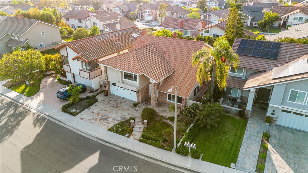 19 Alameda Irvine, CA 92620 - Photo 52 of 59 a view of a house with backyard