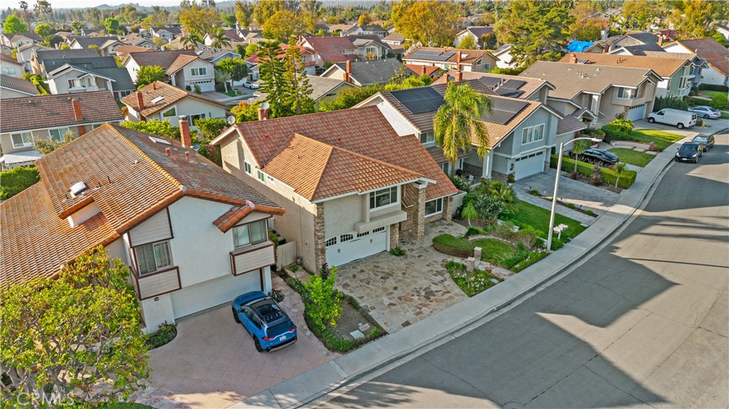19 Alameda Irvine, CA 92620 - Photo 53 of 59 an aerial view of multiple houses with a street