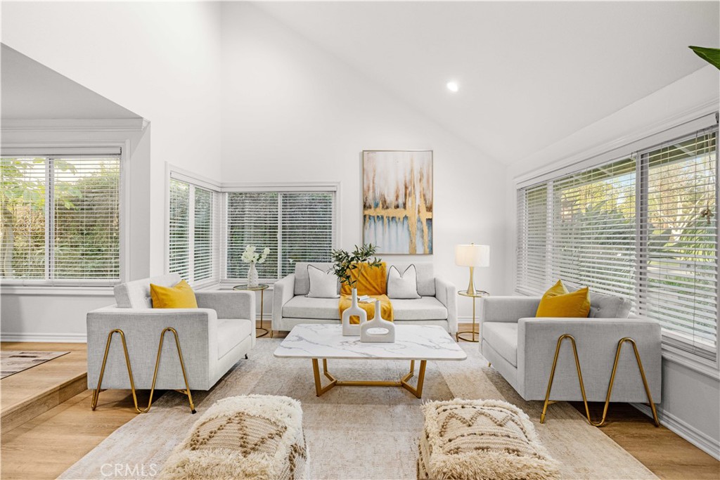 19 Alameda Irvine, CA 92620 - Photo 6 of 59 a living room with furniture and large window with outer view