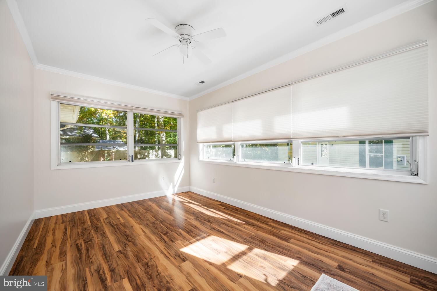 29202 Holly Road Easton, MD 21601 - Photo 19 of 34 a view of an empty room with a window