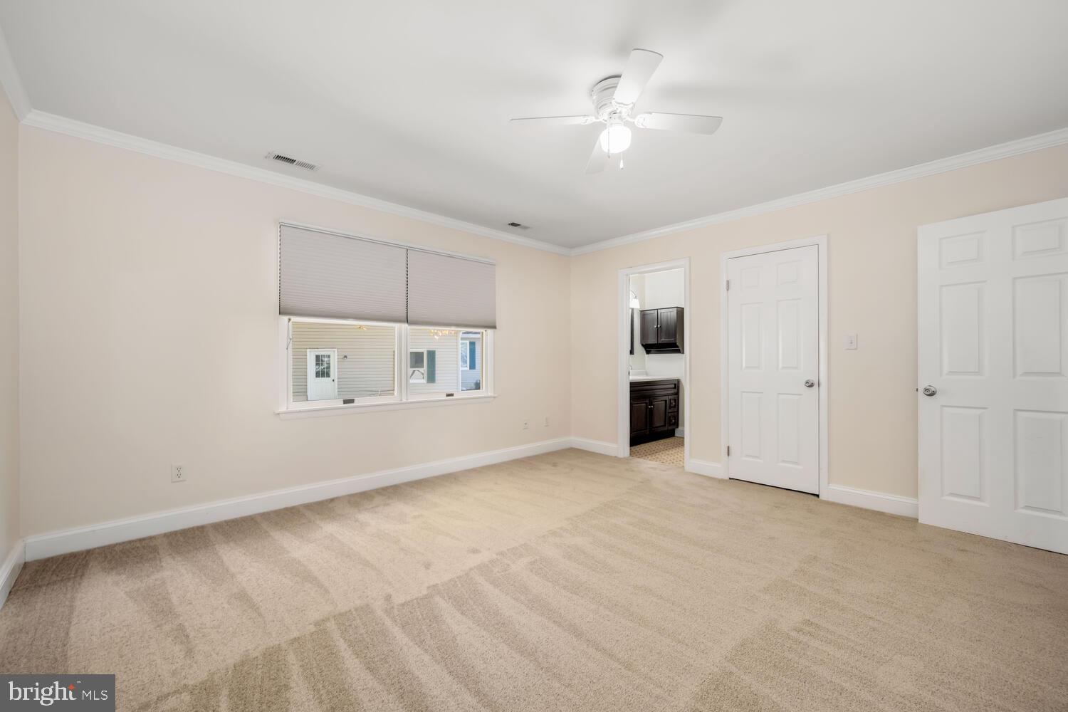 29202 Holly Road Easton, MD 21601 - Photo 22 of 34 a view of an empty room with a window