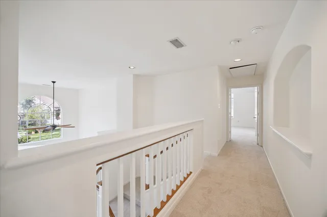 a kitchen with stainless steel appliances granite countertop a stove and a refrigerator