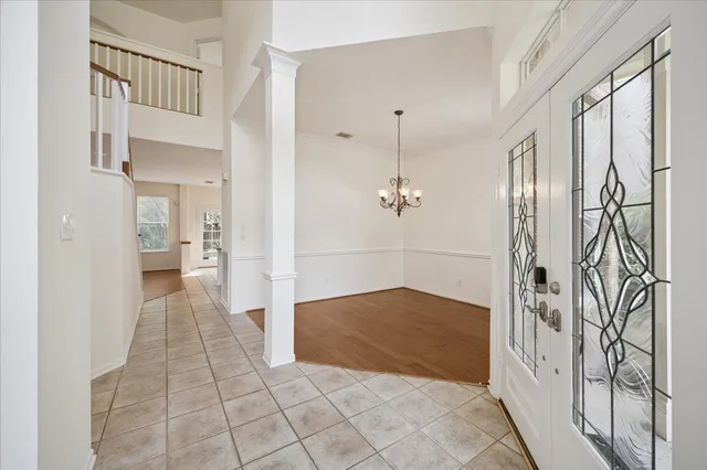 a view of a hallway with a door