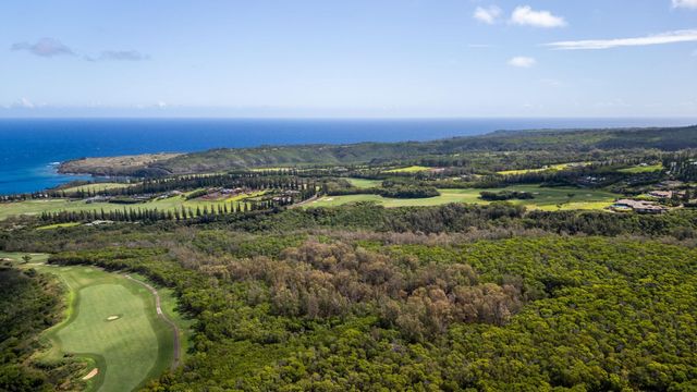 a view of a city with mountains in the background