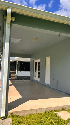 a view of a living room with a bed