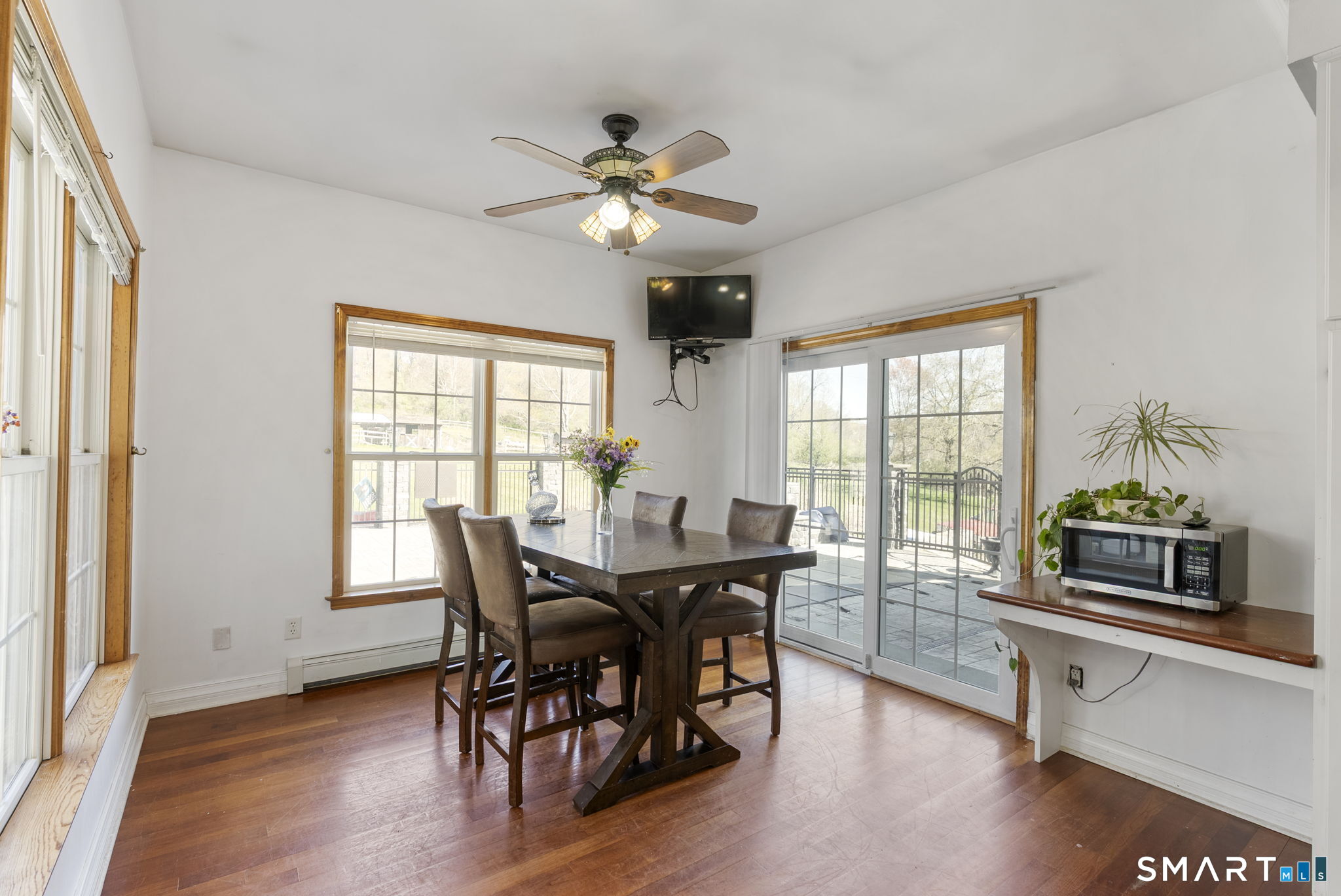 341 High Street Extension Thomaston, CT 06787 - Photo 11 of 39 a view of a dining room with furniture window and wooden floor