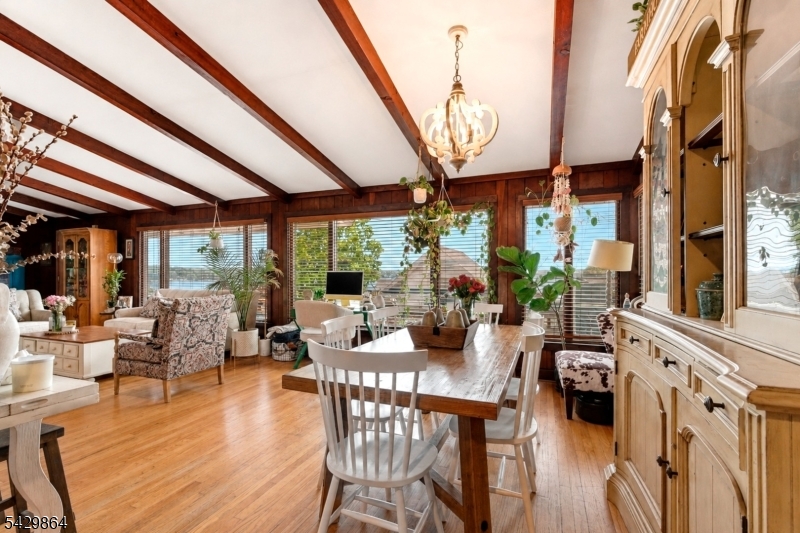 77 Lower North Shore Road Branchville, NJ 07826 - Photo 12 of 38 a view of an dining room with furniture window and outside view