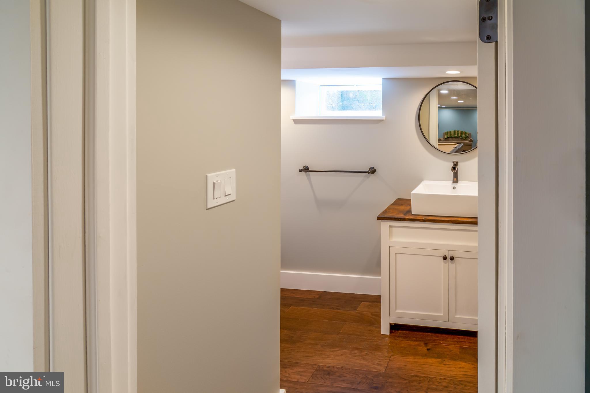 737 Rising Sun Road Telford, PA 18969 - Photo 17 of 21 a bathroom with a sink and a mirror