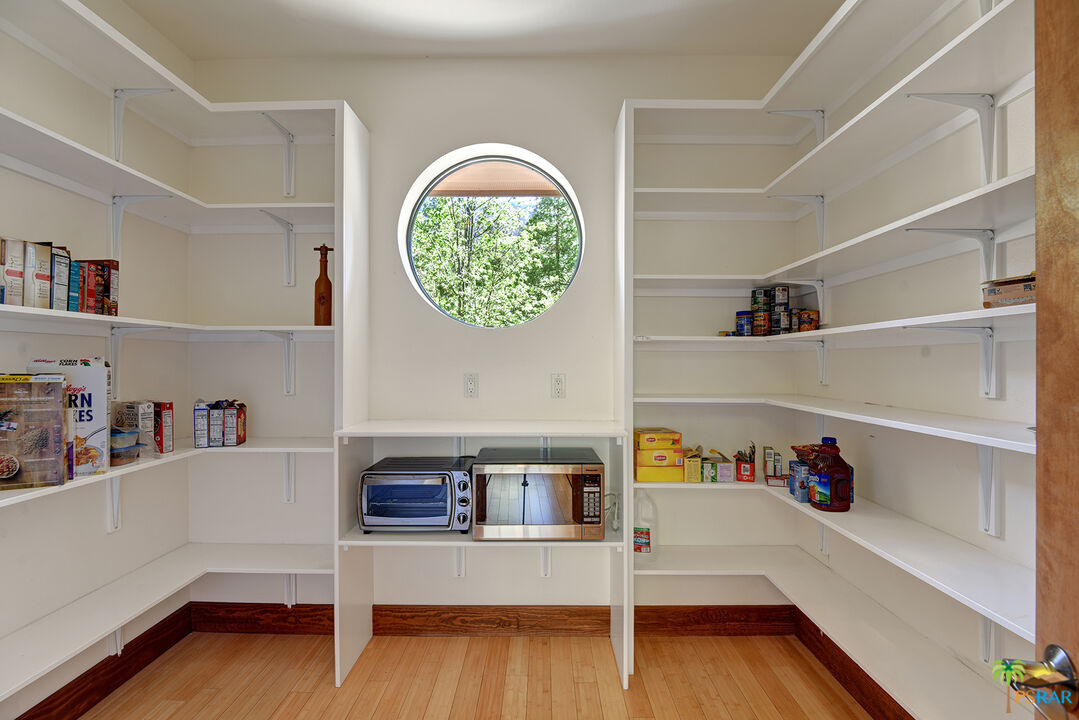 25445 Fern Valley Road Idyllwild, CA 92549 - Photo 27 of 52 a view of room with toys and wooden floor