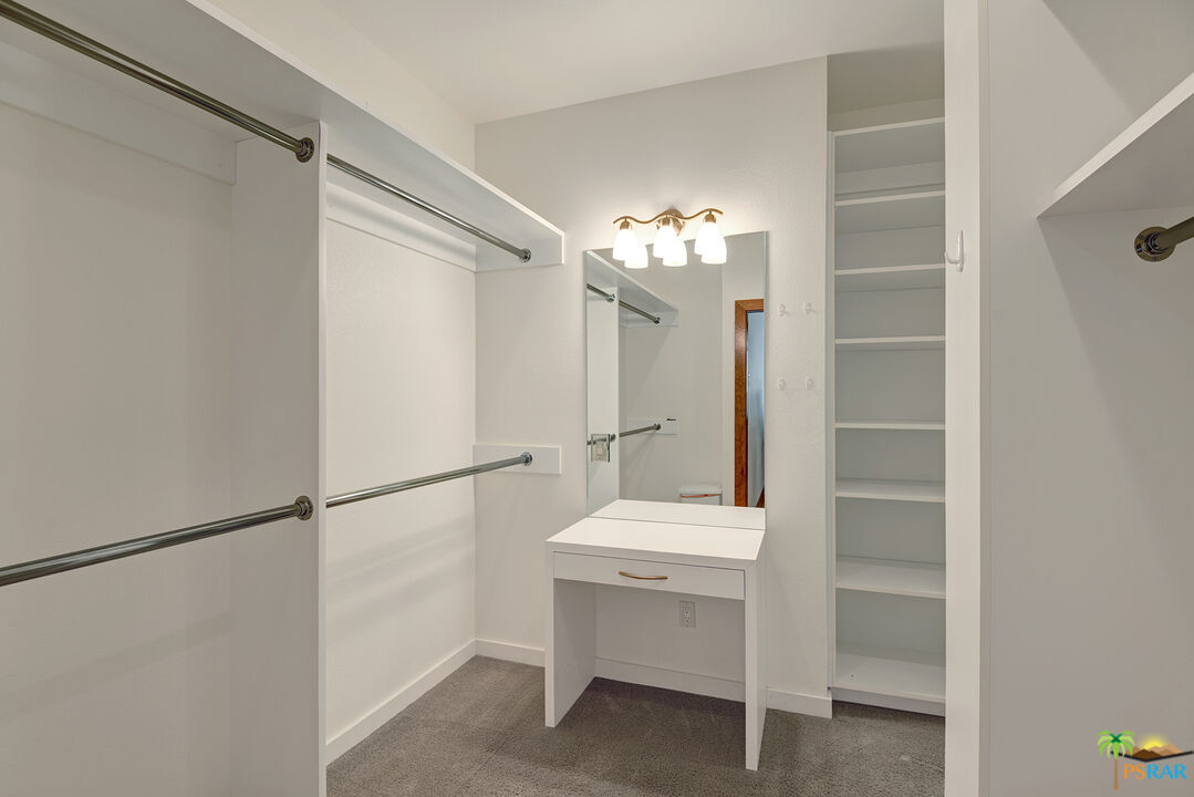 25445 Fern Valley Road Idyllwild, CA 92549 - Photo 40 of 52 a bathroom with a sink mirror and a shower