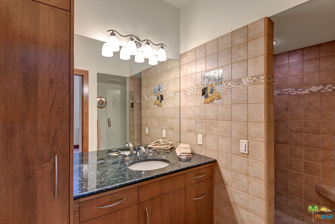 25445 Fern Valley Road Idyllwild, CA 92549 - Photo 41 of 52 a bathroom with a sink shower and a mirror