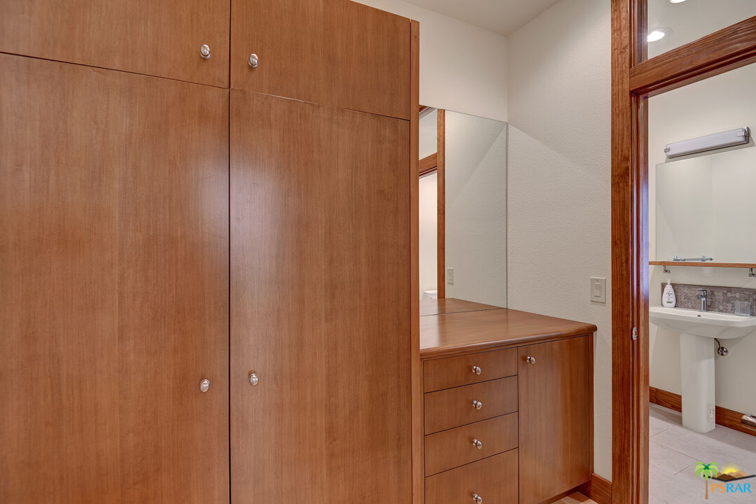 25445 Fern Valley Road Idyllwild, CA 92549 - Photo 46 of 52 a bathroom with a shower and a sink
