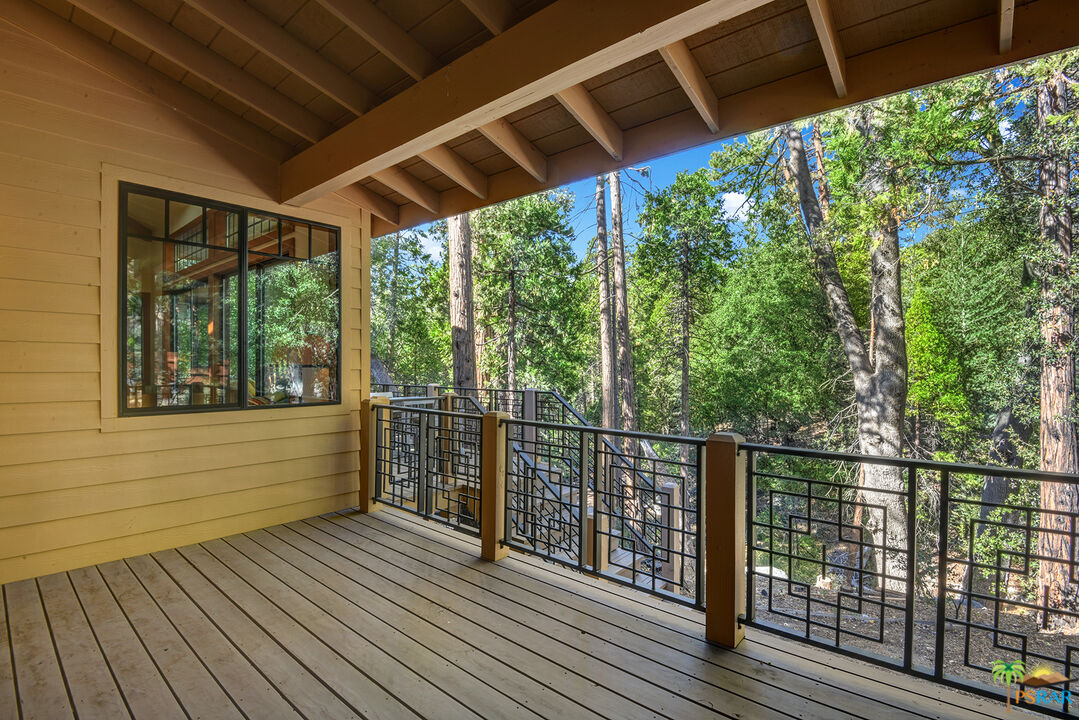 25445 Fern Valley Road Idyllwild, CA 92549 - Photo 10 of 52 a view of a balcony with wooden floor