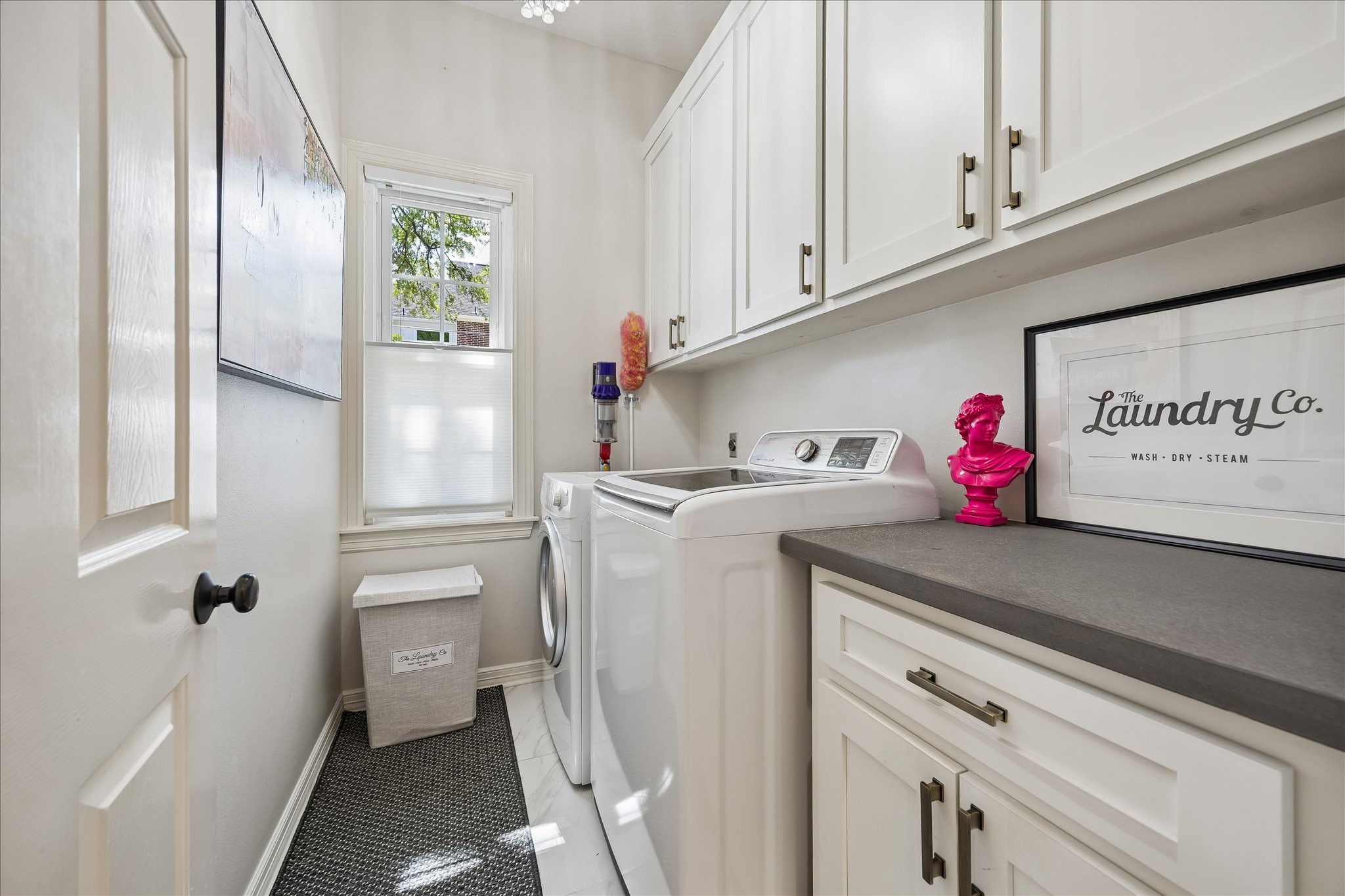 4131 Sunset Boulevard Houston, TX 77005 - Photo 22 of 38 a utility room with dryer and washer