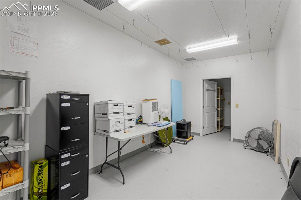 6040 Big Sky Drive Rye, CO 81069 - Photo 27 of 50 a bedroom with a bed and a tv