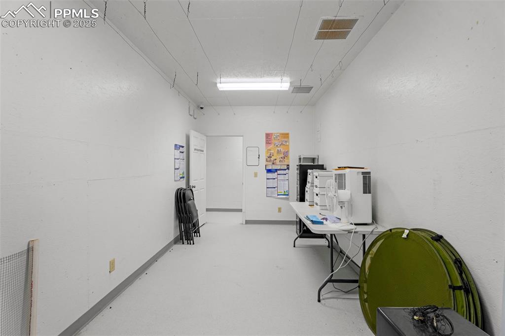 6040 Big Sky Drive Rye, CO 81069 - Photo 28 of 50 a room with a chair and gym equipment