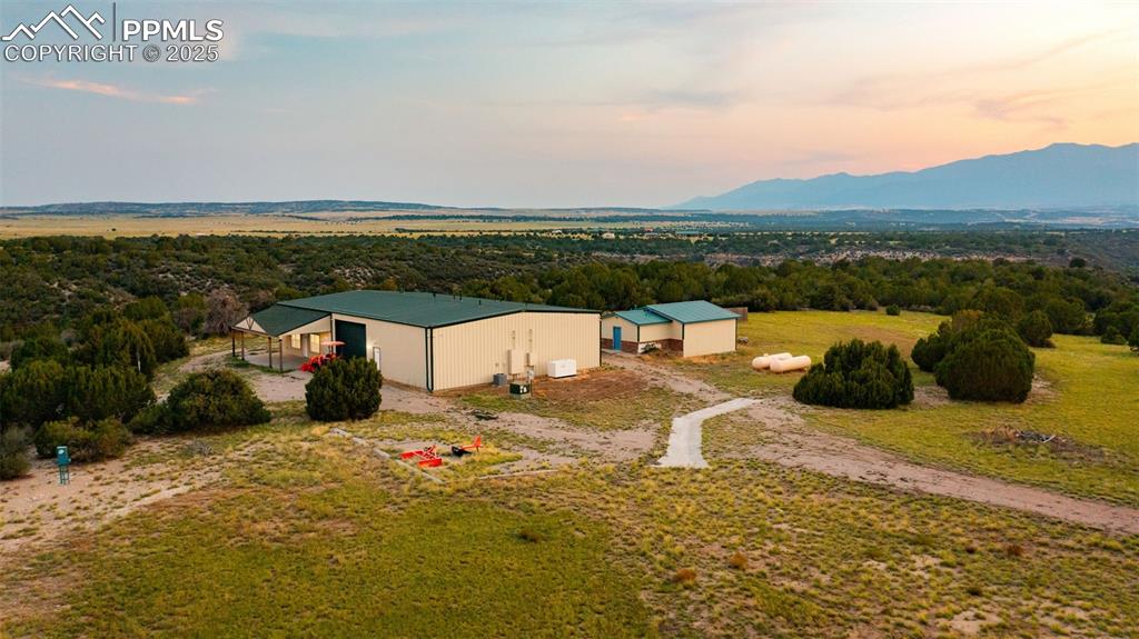 6040 Big Sky Drive Rye, CO 81069 - Photo 49 of 50 a view of a terrace with wooden floor and a floor to ceiling window