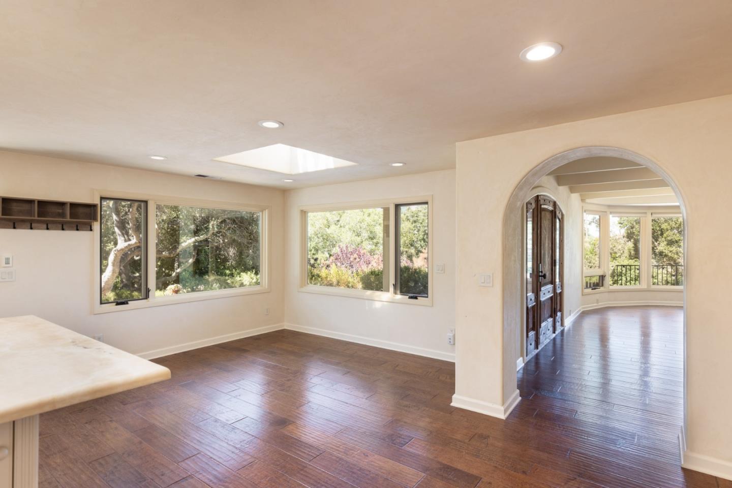 21 La Rancheria Carmel Valley, CA 93924 - Photo 7 of 44 a view of empty room with wooden floor and fan