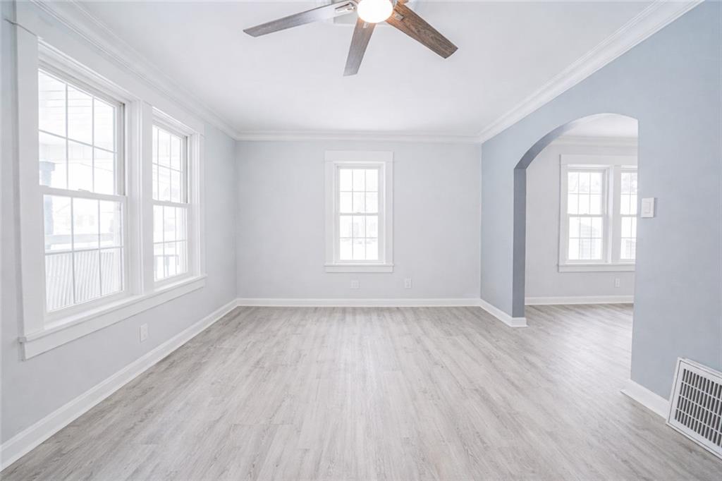 671 Old Rte 8 Harrisville, PA 16038 - Photo 12 of 49 wooden floor in an empty room with a window
