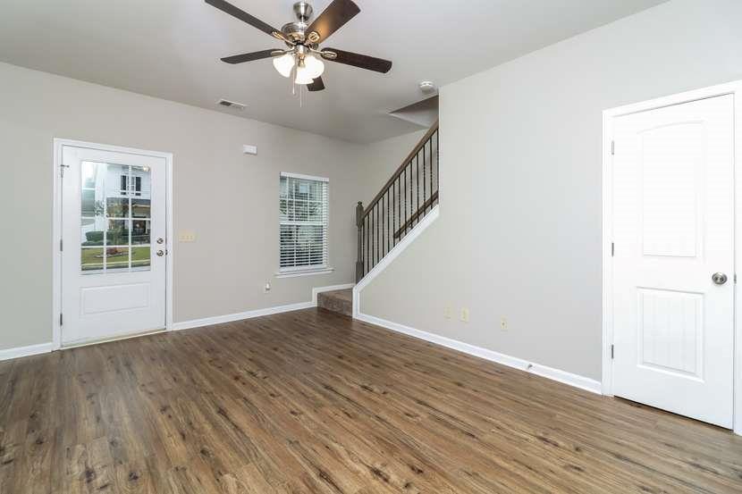 113 Howard Avenue Cartersville, GA 30121 - Photo 6 of 17 a view of an empty room with wooden floor and a window