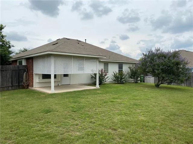 a house view with a garden space