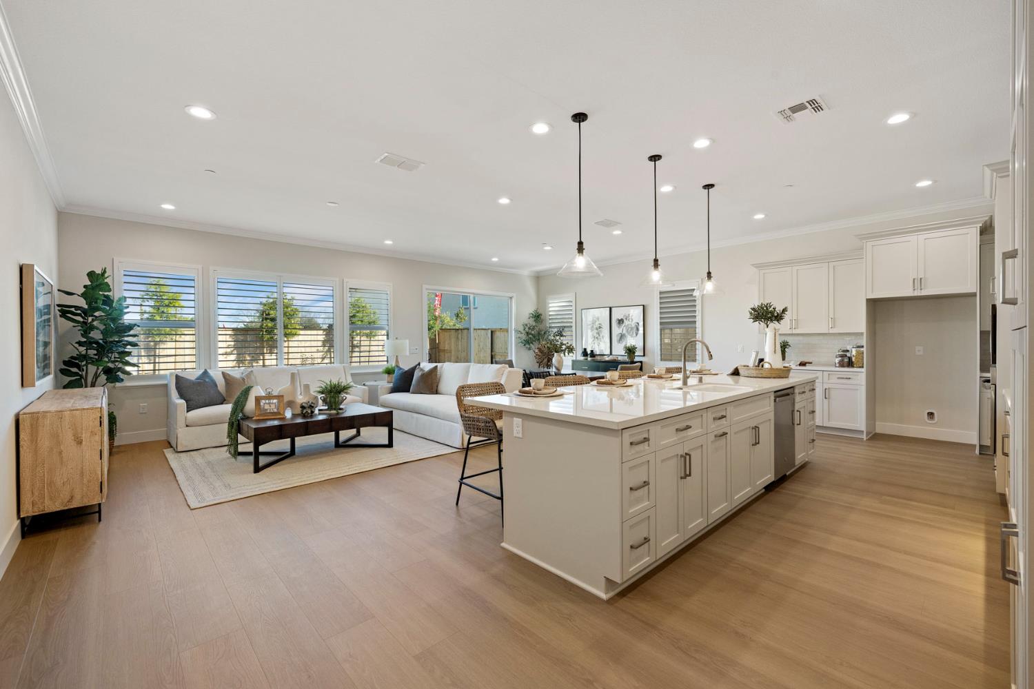 2252 Lyndon Street Lodi, CA 95242 - Photo 15 of 23 a large living room with stainless steel appliances kitchen island granite countertop a large kitchen a sink and a living room view
