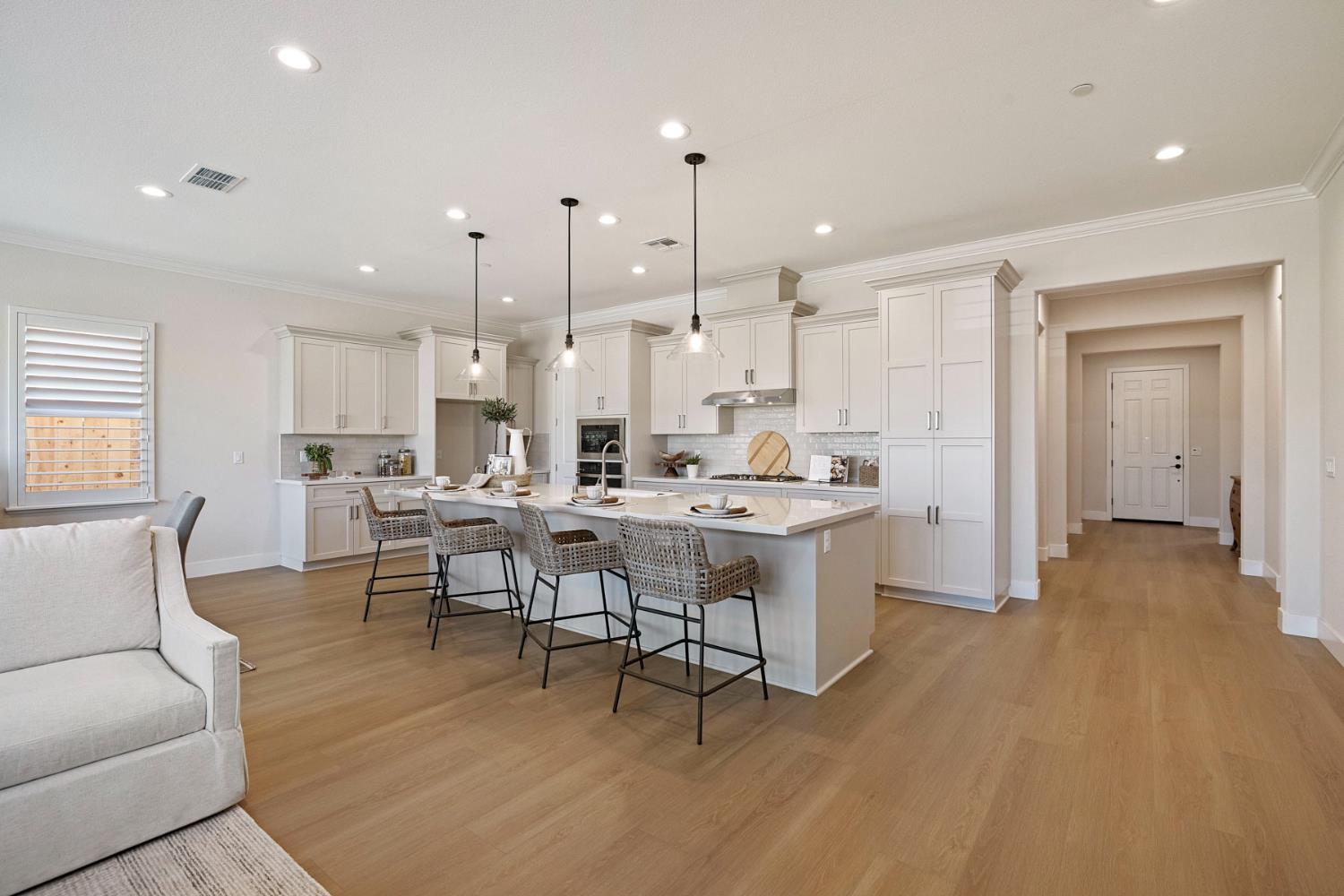 2252 Lyndon Street Lodi, CA 95242 - Photo 18 of 23 a large kitchen with a table and chairs