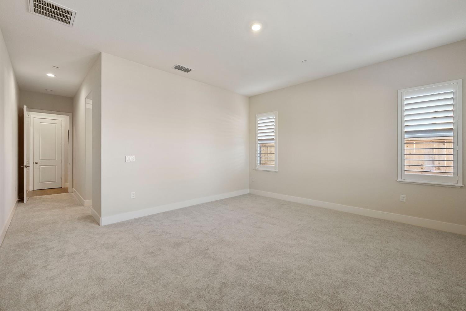 2252 Lyndon Street Lodi, CA 95242 - Photo 7 of 23 an empty room with windows and closet