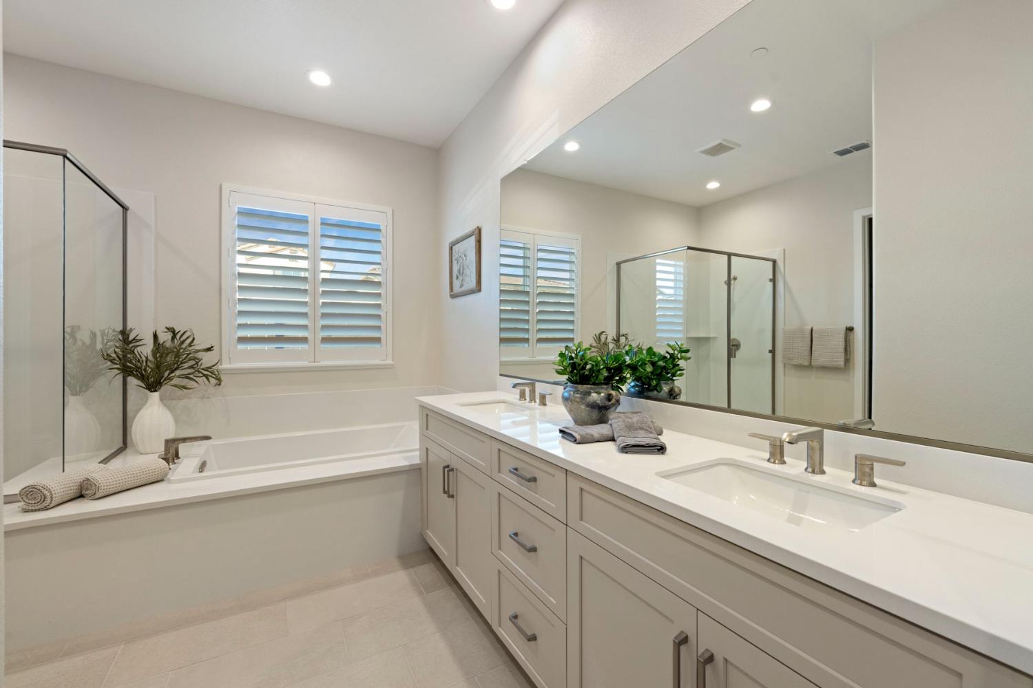 2252 Lyndon Street Lodi, CA 95242 - Photo 10 of 23 a bathroom with a tub a sink and mirror