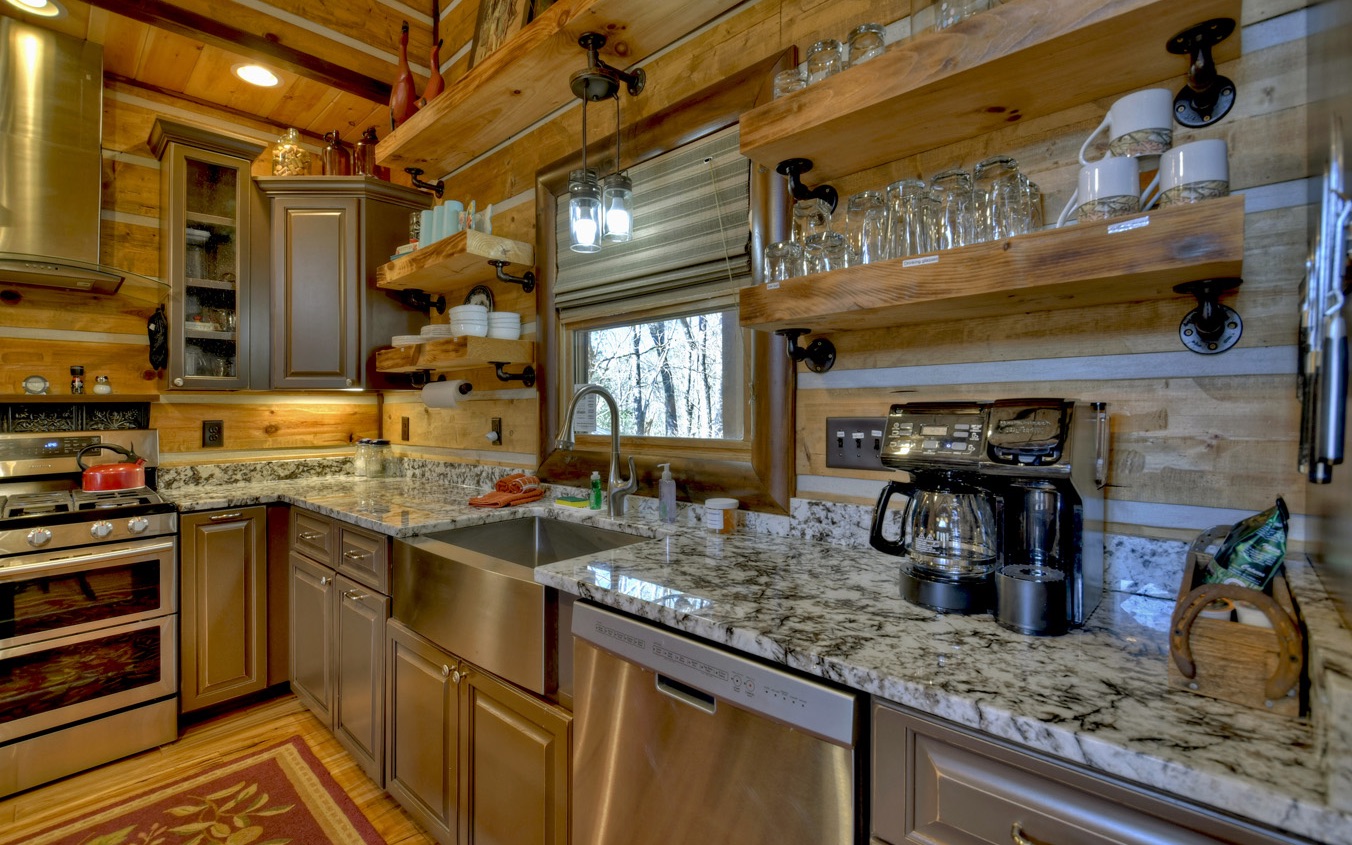 2124 Maxwell Road Blue Ridge, GA 30513 - Photo 18 of 66 a kitchen with sink and cabinets