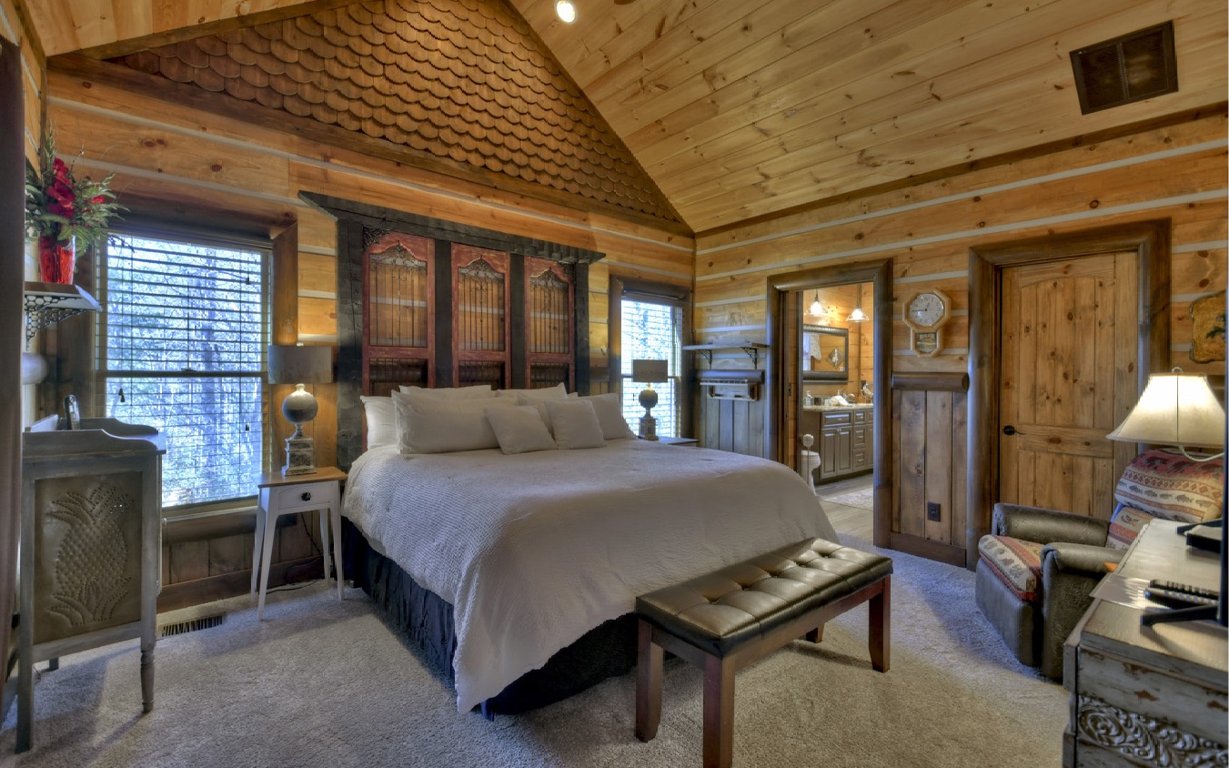 2124 Maxwell Road Blue Ridge, GA 30513 - Photo 22 of 66 a bed room with a bed and a television