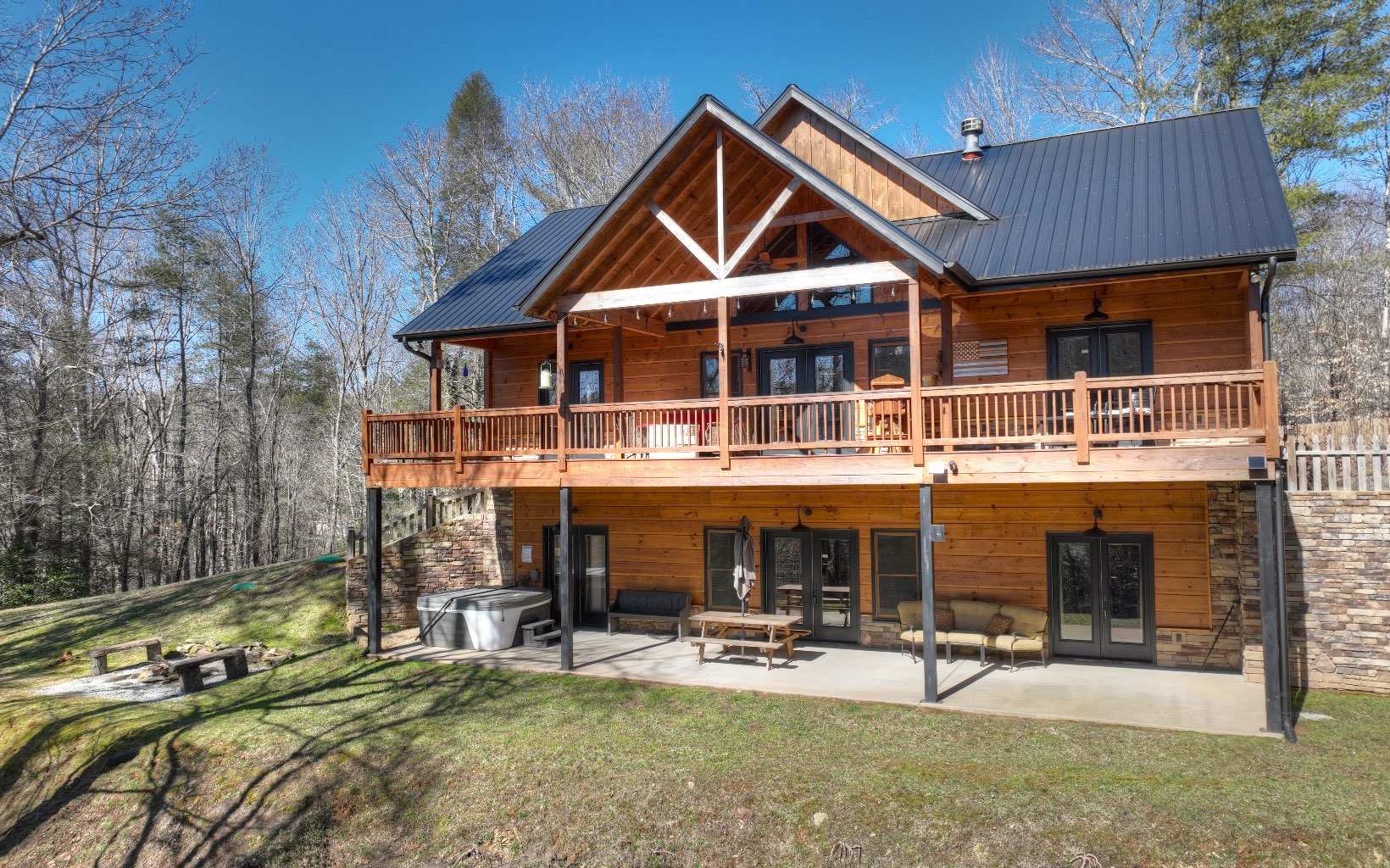 2124 Maxwell Road Blue Ridge, GA 30513 - Photo 41 of 66 a front view of a house with sitting area and garden
