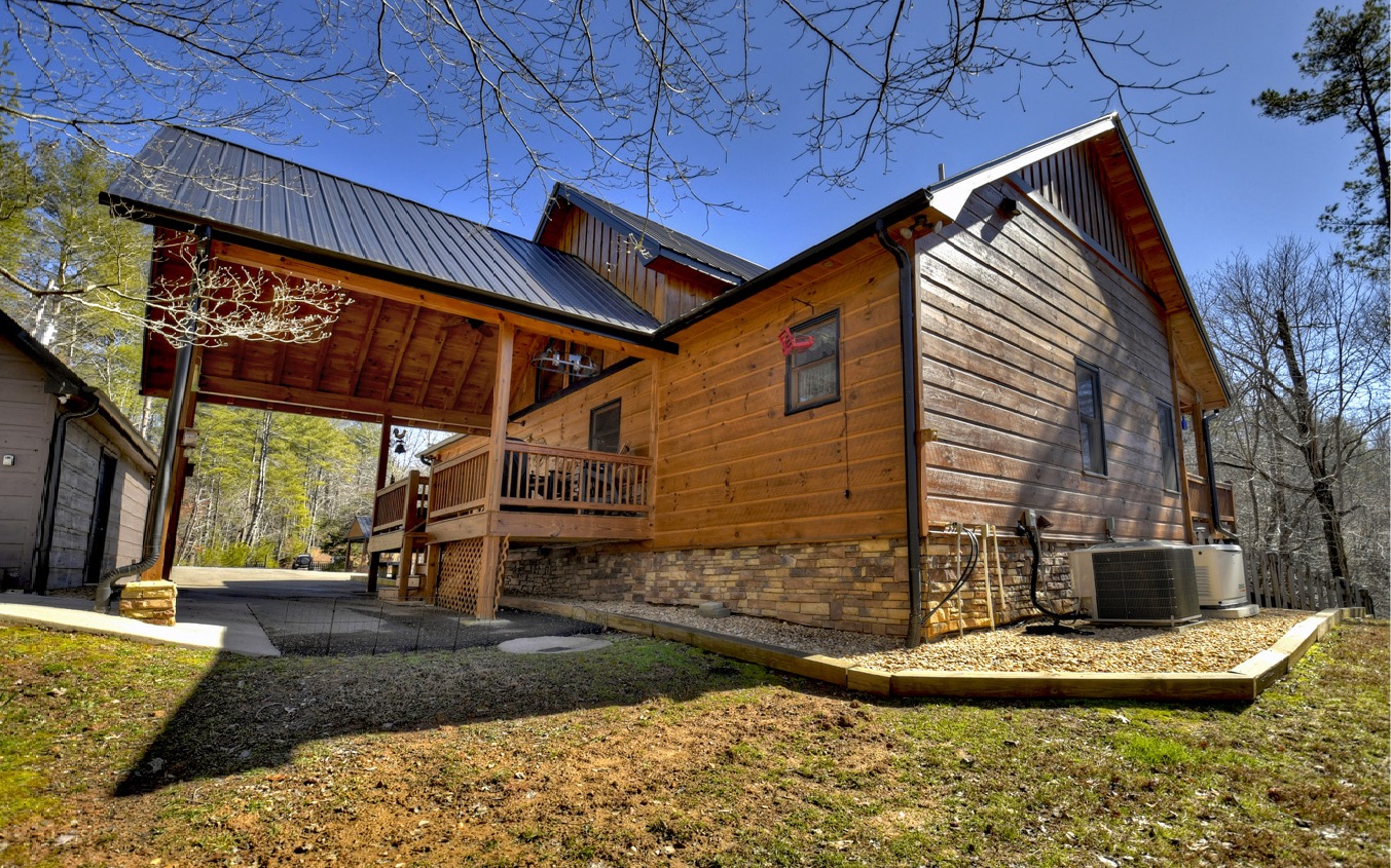 2124 Maxwell Road Blue Ridge, GA 30513 - Photo 53 of 66 a view of a house with a porch
