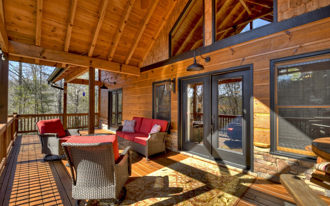 2124 Maxwell Road Blue Ridge, GA 30513 - Photo 59 of 66 a balcony with furniture and a potted plant