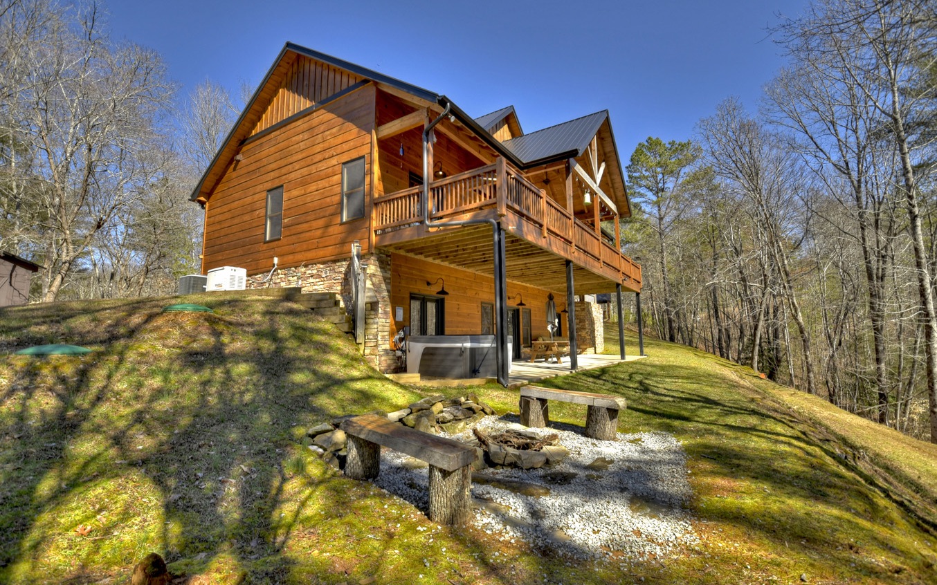 2124 Maxwell Road Blue Ridge, GA 30513 - Photo 61 of 66 a view of a house with backyard and trees