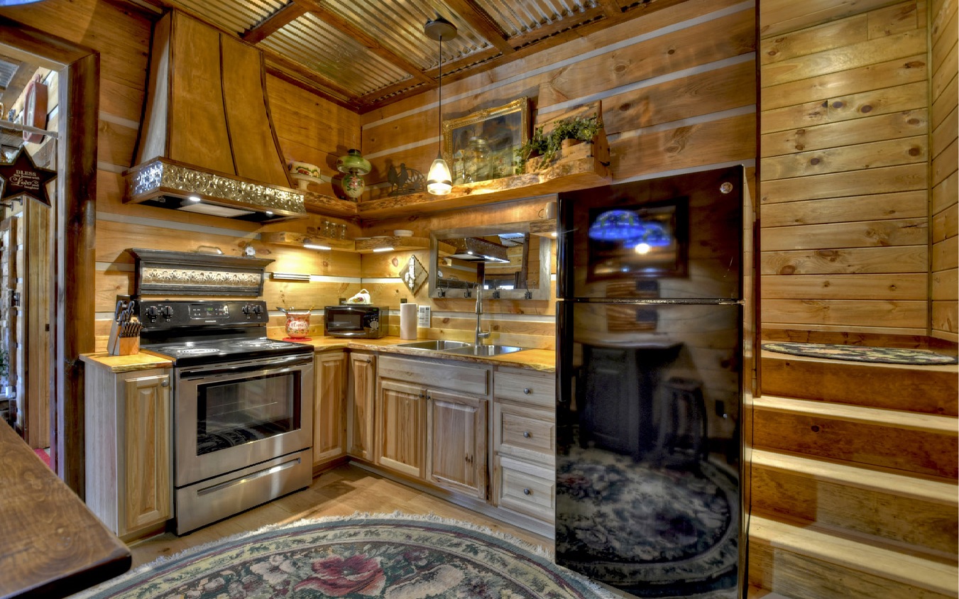 2124 Maxwell Road Blue Ridge, GA 30513 - Photo 7 of 66 a kitchen with stainless steel appliances granite countertop a stove and a refrigerator