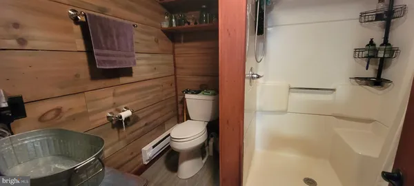 a bathroom with a toilet and a sink