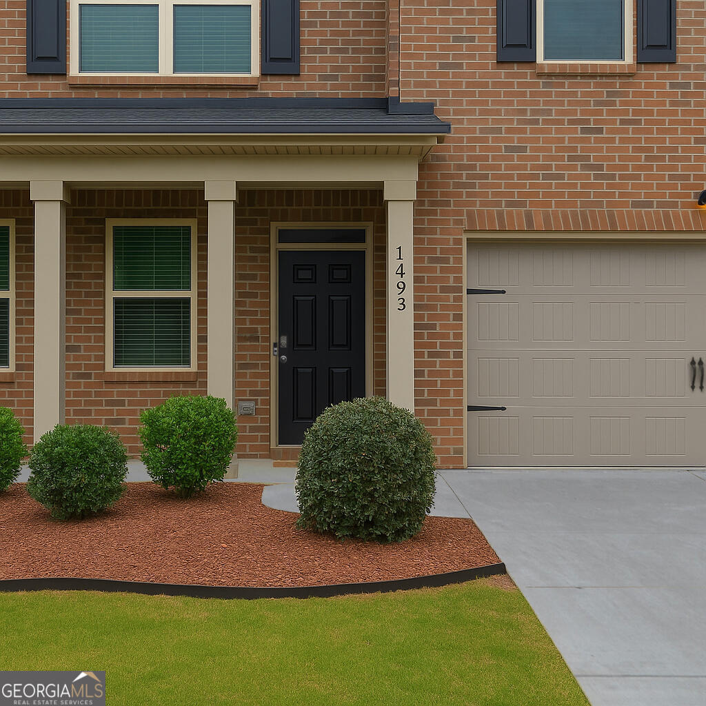 1493 Harlequin Way Stockbridge, GA 30281 - Photo 7 of 15 a house view with a garden space