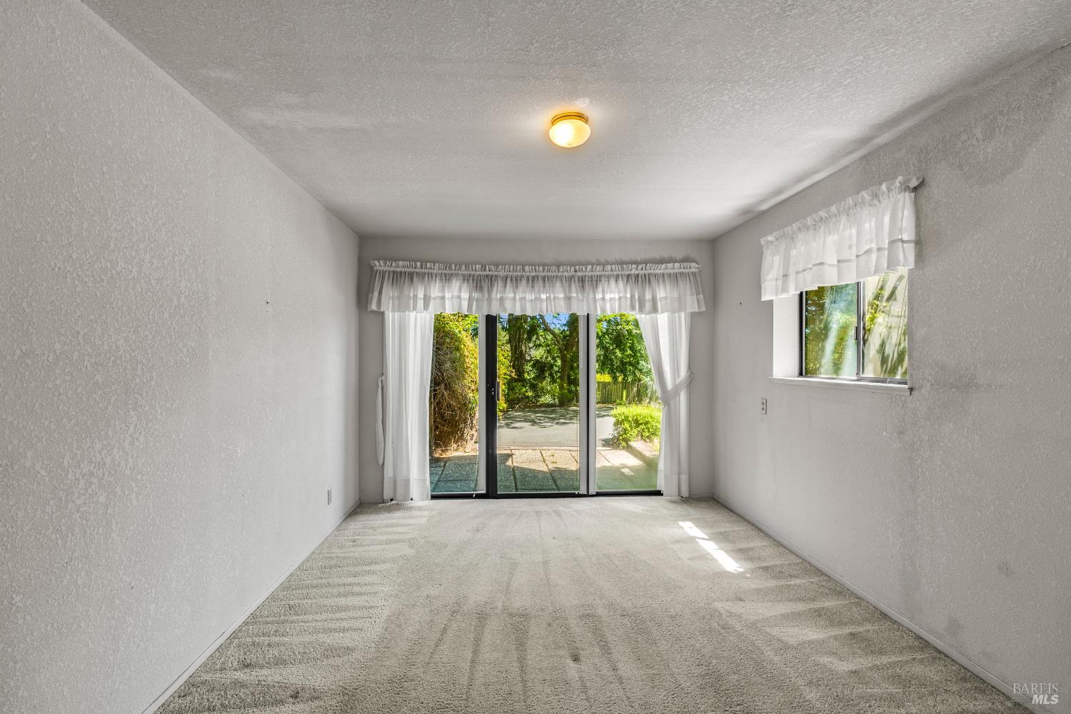 625-629 Hill Road Angwin, CA 94508 - Photo 51 of 64 wooden floor in an empty room with a window
