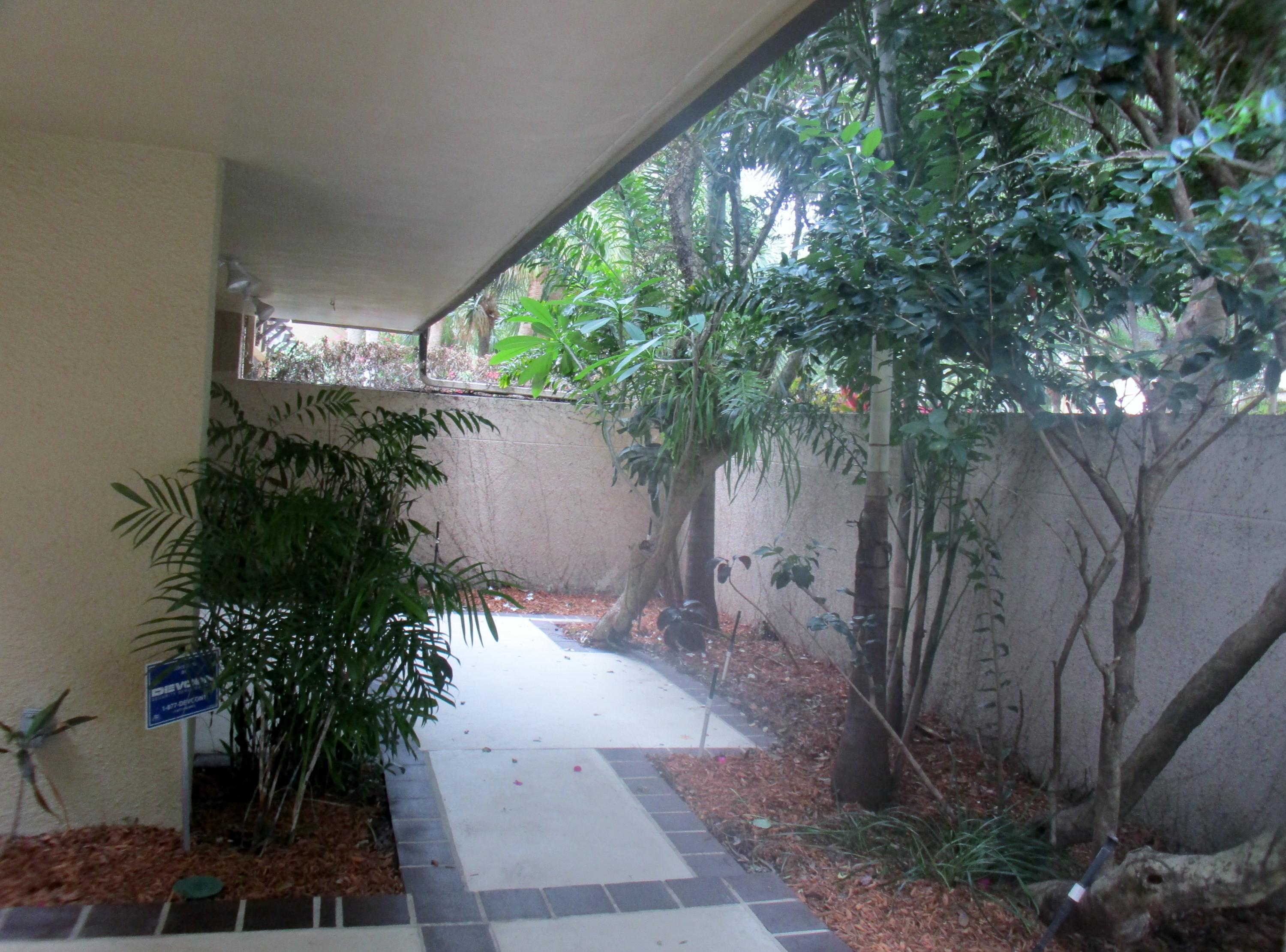 791 St Albans Drive Boca Raton, FL 33486 - Photo 3 of 41 Outside Walkway to Front Patio
