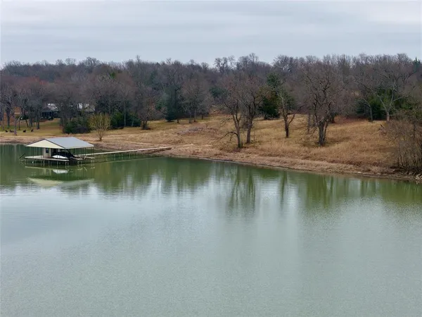 a view of a lake with mountain