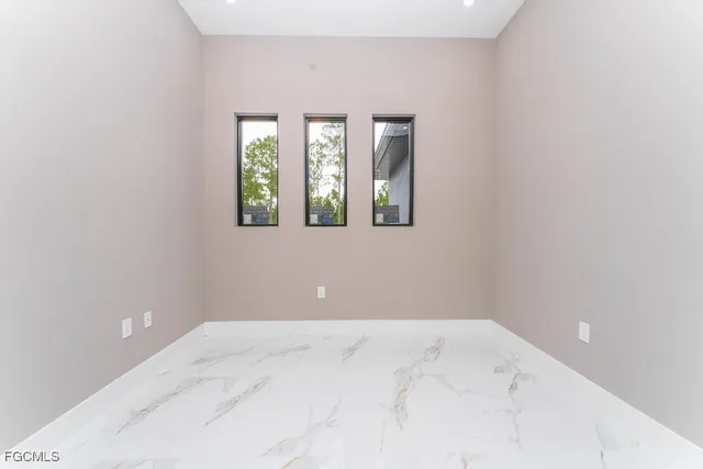 an empty room with windows